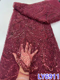 Red sequin fabric with a hand for scale on a white background, labeled LY6911.