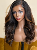 Mannequin head with a brown wig on a yellow background